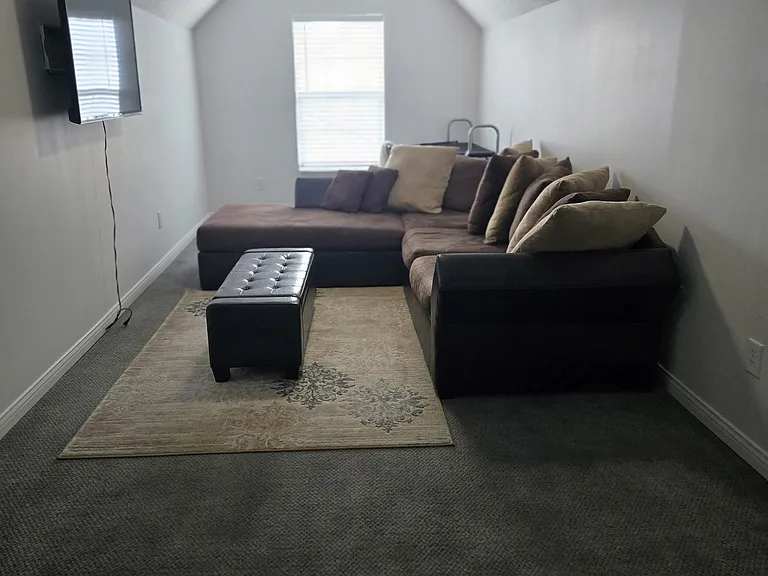Family Room Over Garage (FROG): Includes a remote-controlled ceiling fan and 50" TV. Other furniture presented in this picture IS NOT INCLUDED.