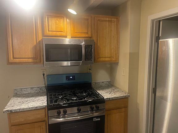 New stove and wall microwave