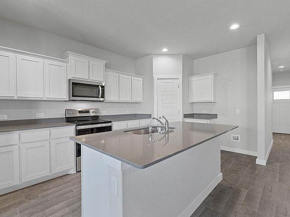 All photos shown here may not depict the specified home & features included are for illustration purposes only.