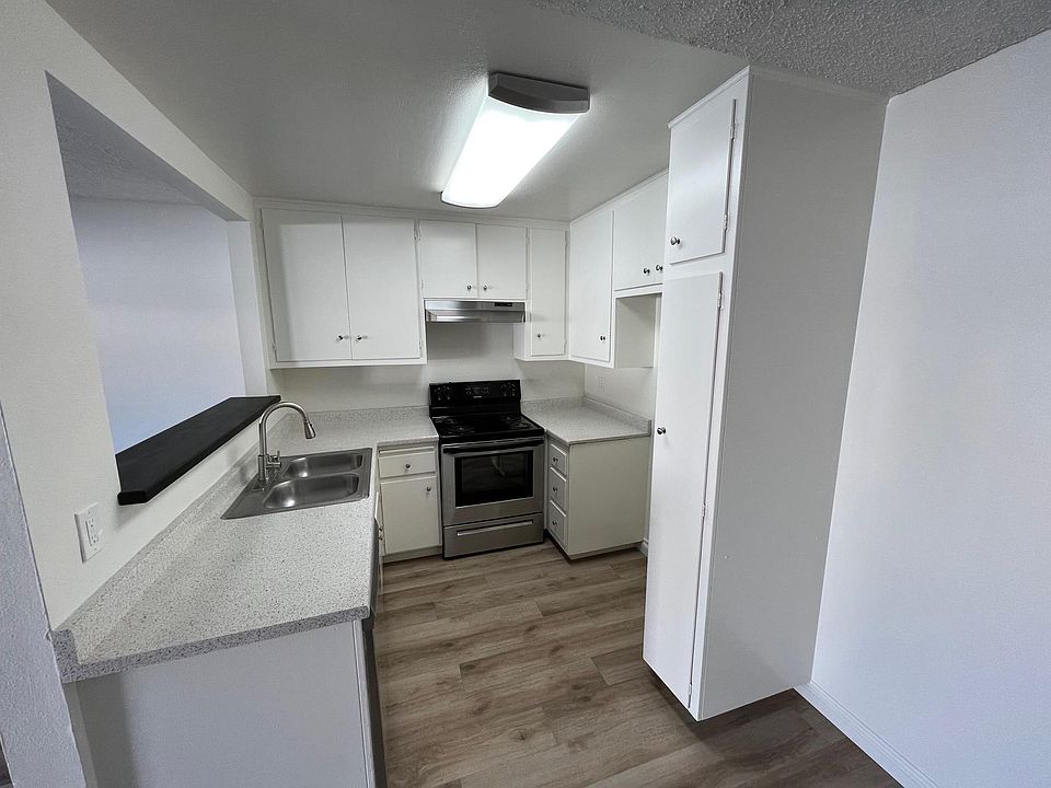 This downstairs 2x2 kitchen has stainless steel appliances