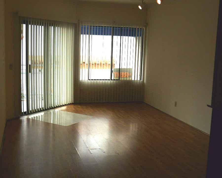 Looking across living room from entryway. Terrace is to the left.