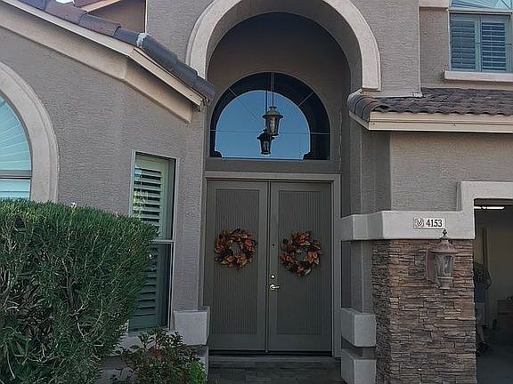 Upgraded travertine entry.