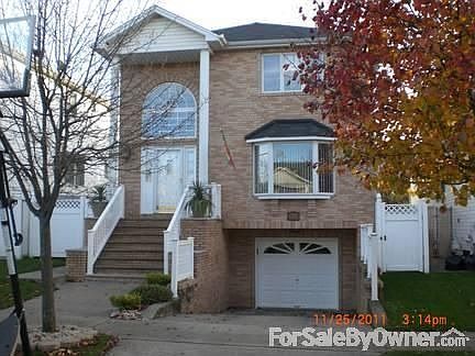 Brick Front w/Bay Window
						:
						Quiet Tree Lined Extra Wide Street