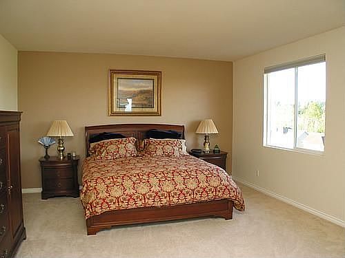 Large master suite with small sitting area