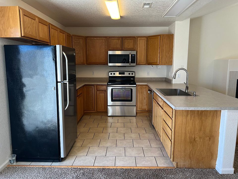 Large stainless steel kitchen with a deep bay sink