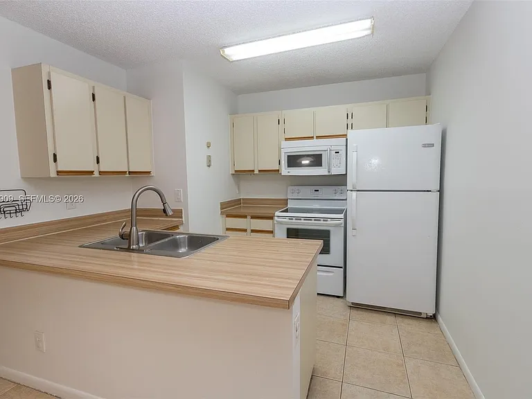18304 NW 68th Ave #L — Photo 1