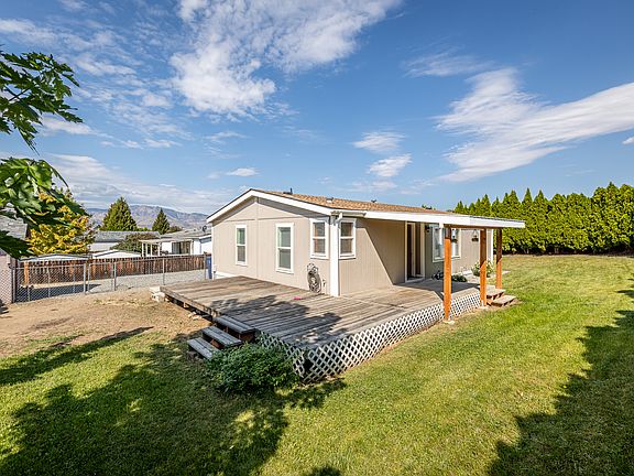 Wrap-around deck with covered porch.