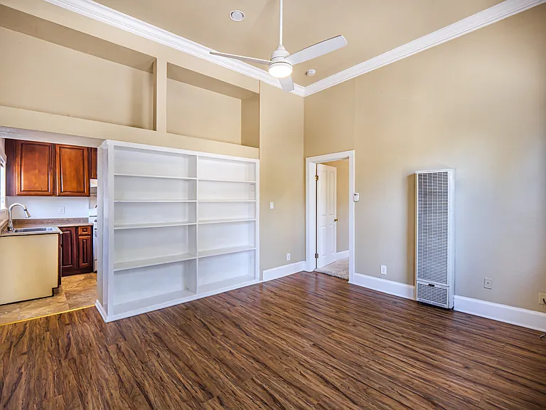 Large living/dining area with high ceilings