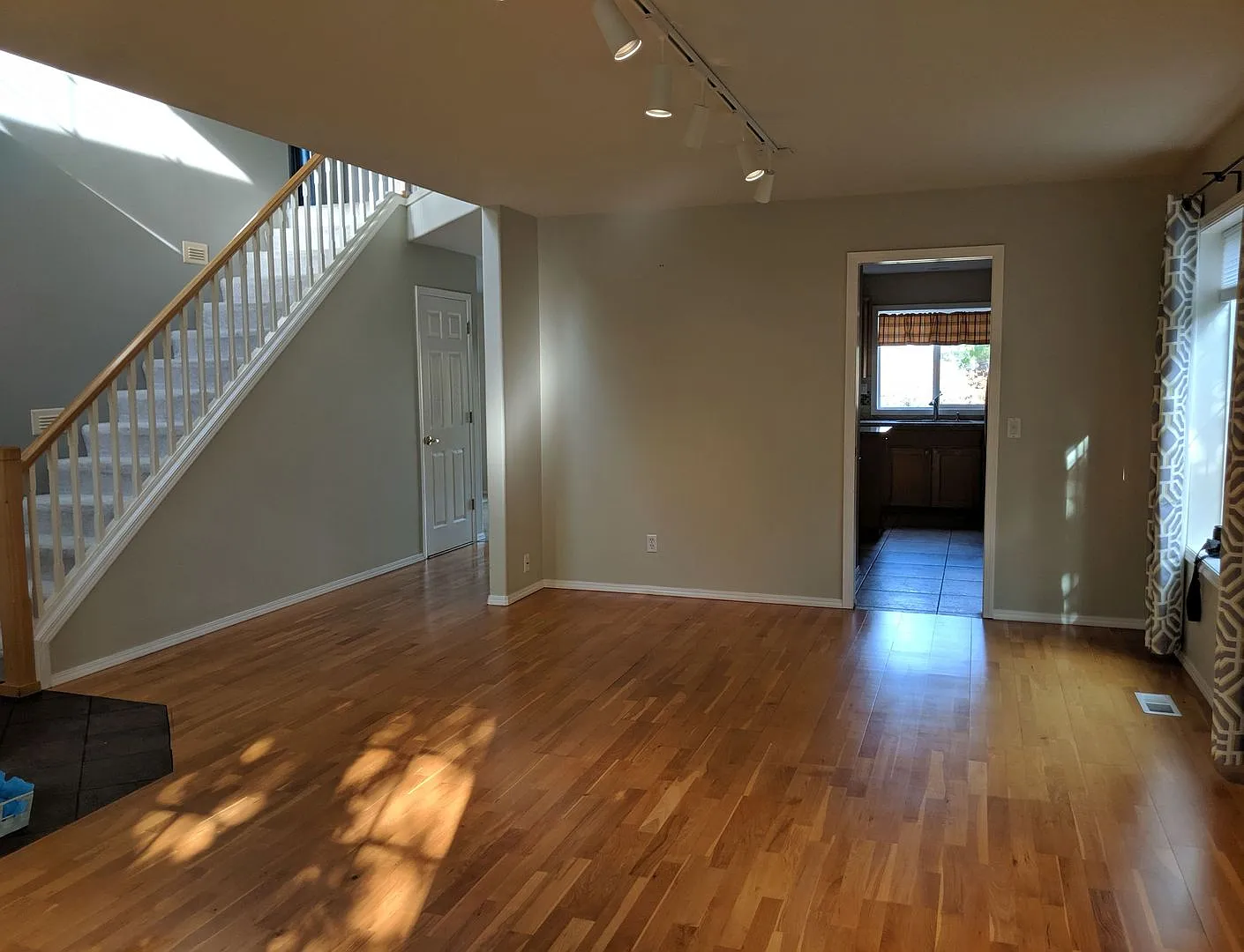 Spacious 4 Bedroom Home with Bay Windows, Open Kitchen, Two Living Areas & Private Deck — Photo 4