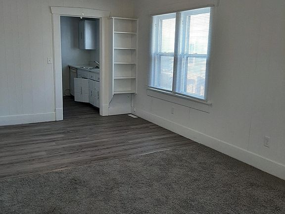 Another view of living / dining room looking through to kitchen