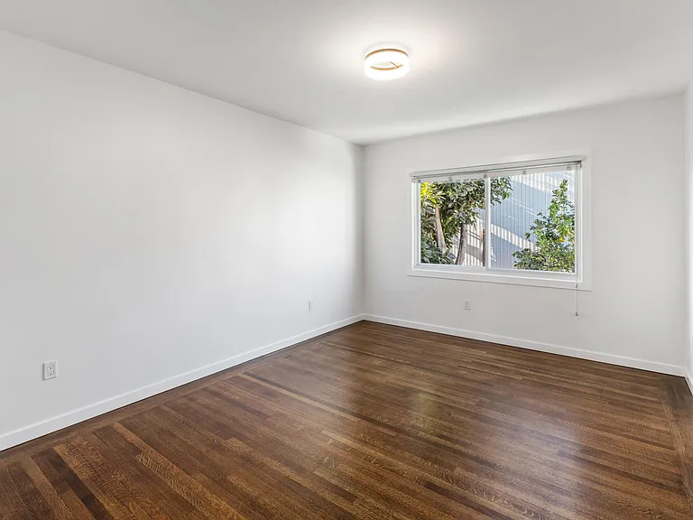 Master bedroom overlooking the backyard