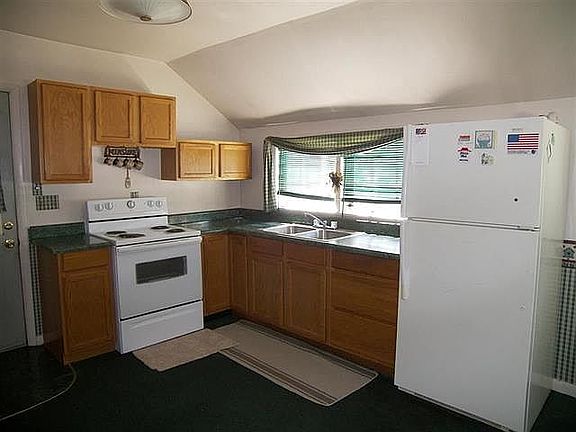 stove and frig remain