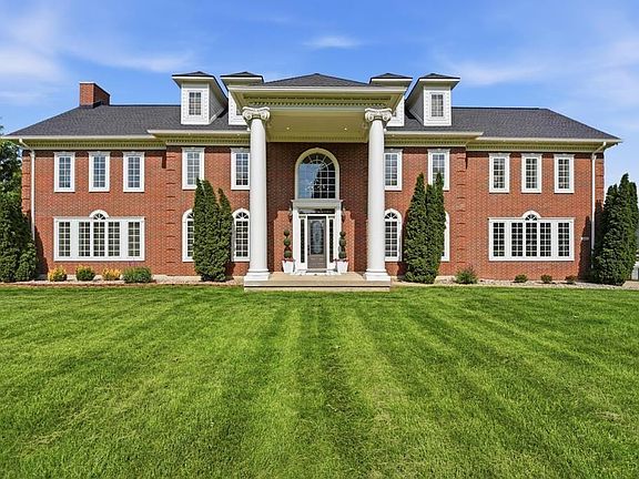 Stately all brick home on 13.5 acres