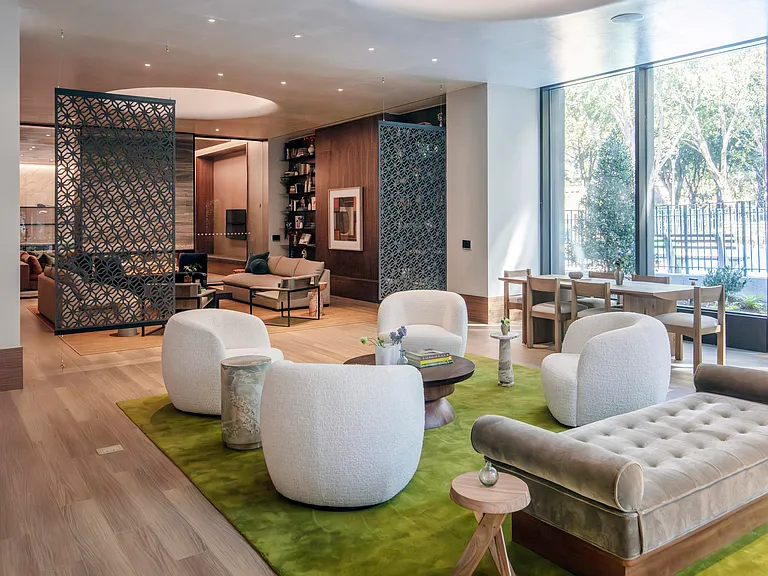Welcome to Mabel, where modern design meets comfort. Our inviting lounge features lush greenery, stylish seating, and a vibrant atmosphere perfect for relaxation or socializing. Schedule your visit today and see the difference for yourself!