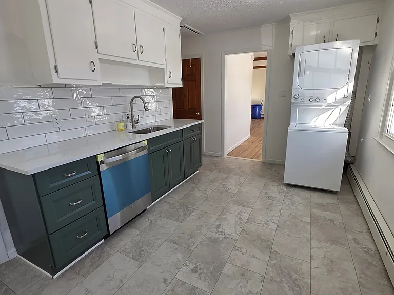 Space saving stacked washer and dryer