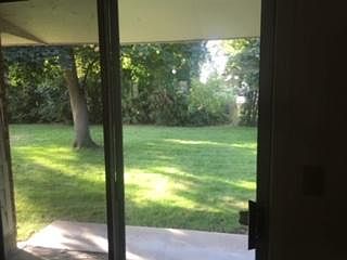 Big Shady Green Yard facing south for Sunny Winter Exposure, Garden in Summer. Covered Patio