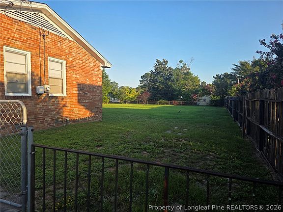 3rd image of 712 E Country Club Dr NW
