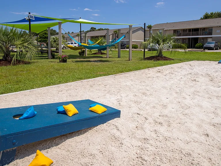 Enjoy a game of cornhole at our designated recreation sandbox.
