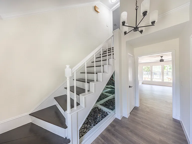 Entry way and stairs to upstairs living room and bedroom