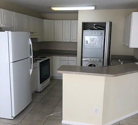 Kitchen with Washer and Dryer