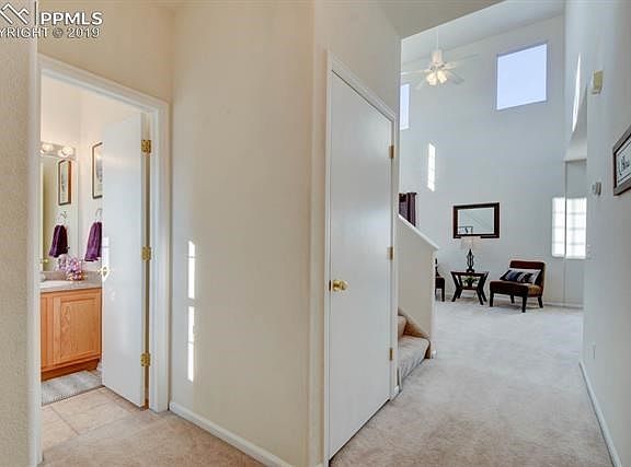 The front door entry way opens up to the spacious open concept great room with vaulted ceilings.