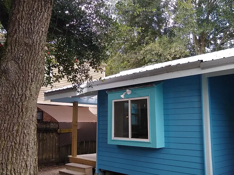 Great live oak tree and cute little yard space (not fenced but quite private)