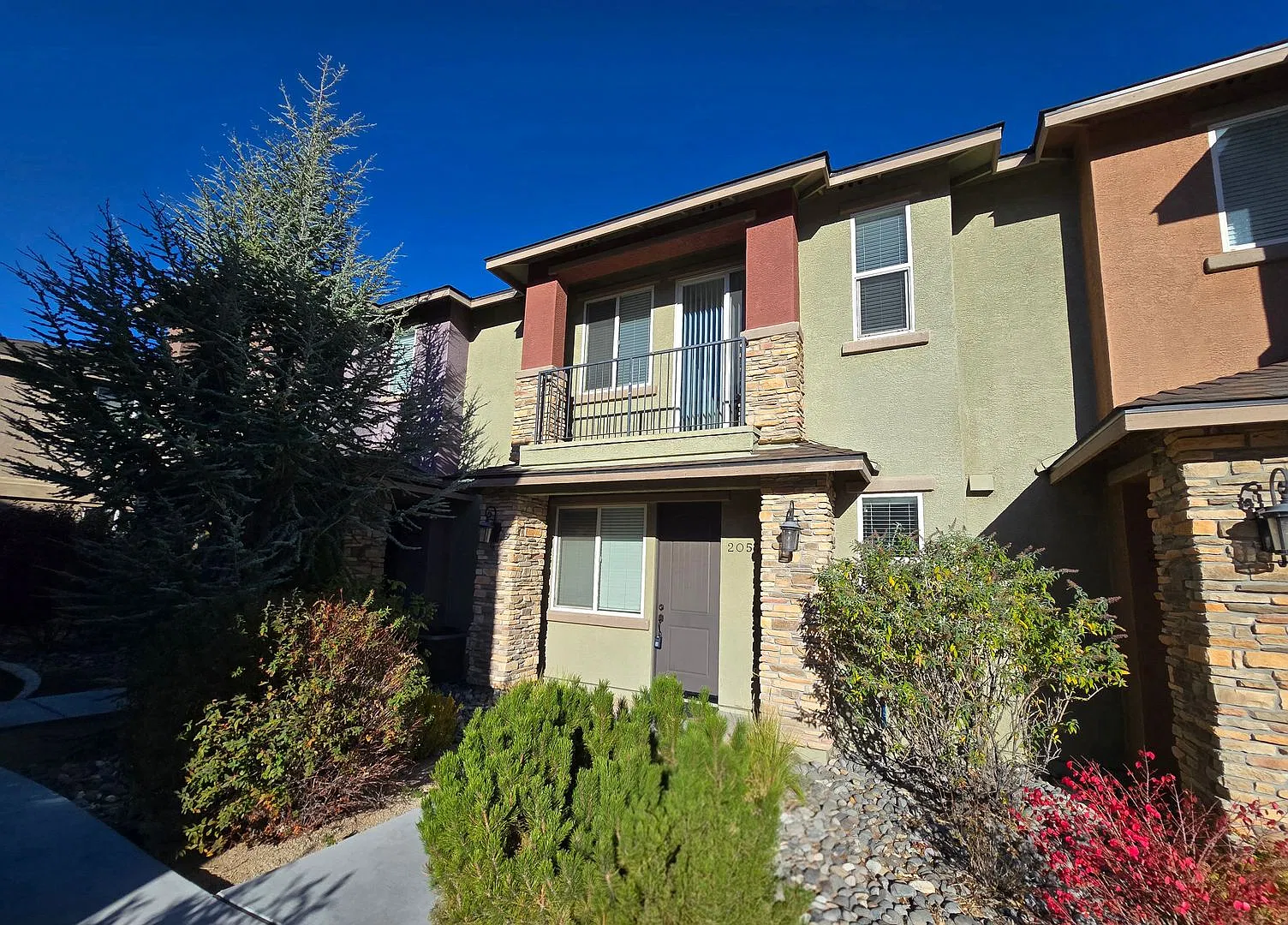 Sunlit Reno Home with Spacious Loft, Balcony & 2-Car Garage — Photo 1