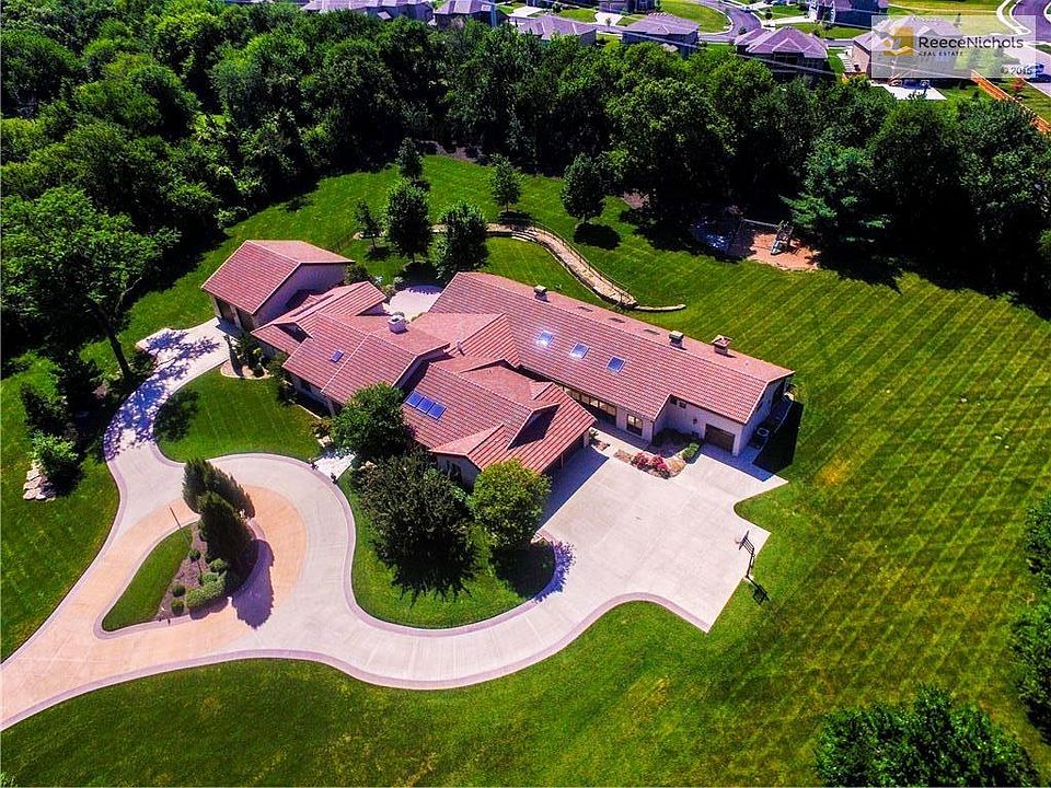 Welcome to 20905 W. 106th Street in Millcreek Farm subdivision on 2.5+/- acres.  This drone view captures the extreme beauty of the property.