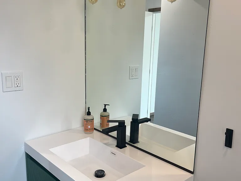 Lots of light over the vanity.