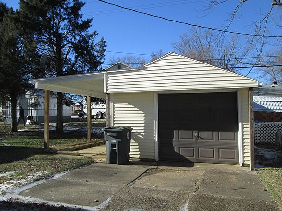 One car garage and covered storage.