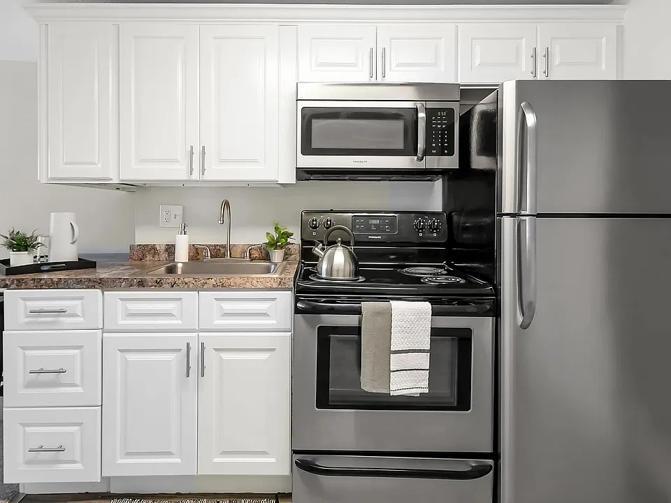 Savor the excellence of our renovated kitchens, featuring a brand-new stainless steel appliance package that encompasses a stove, microwave, refrigerator, and dishwasher along with modern, plentiful cabinetry for storage.