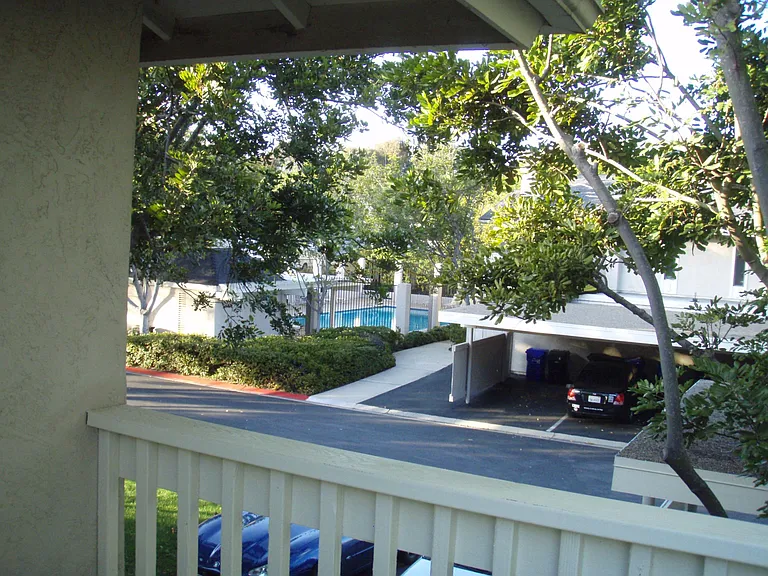 Carport, one covered space and one open
