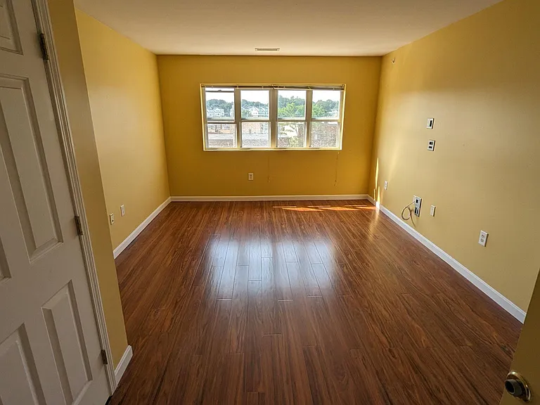 Primary bedroom: 
12' x 18'6", 2 closets, hardwood floor