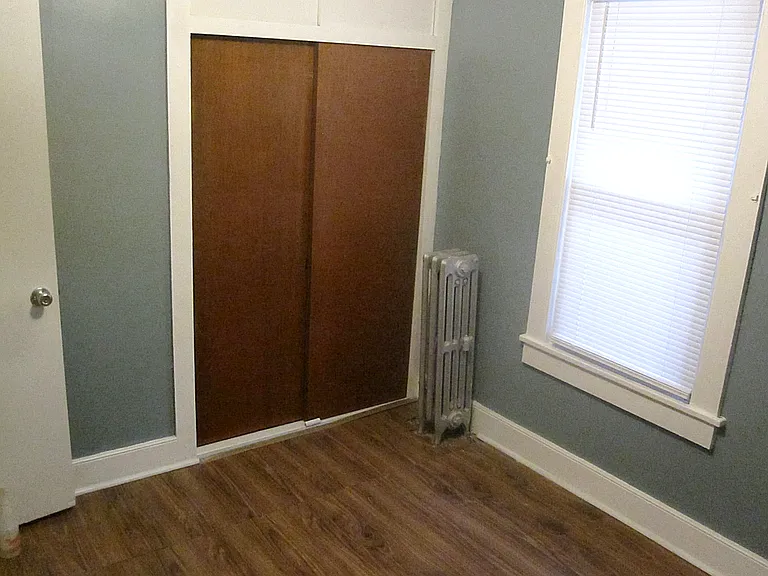 Middle bedroom, angle 1 of 2.