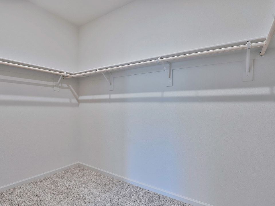 Residence 1 primary walk-in closet at a nearby Meritage community.