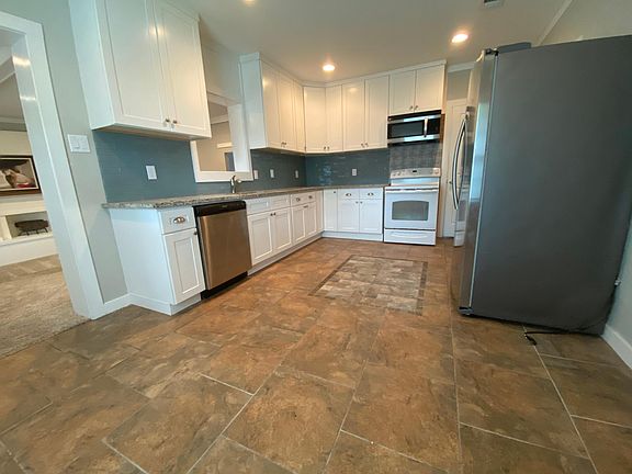 Kitchen (there is a window) and open area is large enough for kitchen table