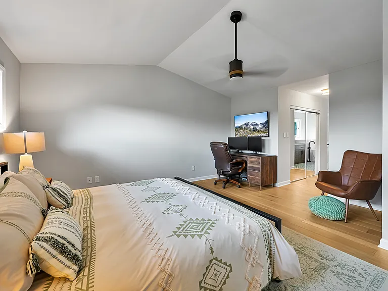 Oversized primary bedroom with room for home office