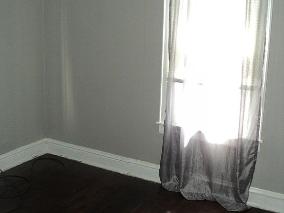 Bedroom with wood floor