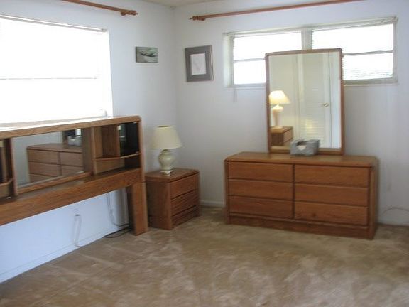 Master bedroom with sliders to patio 