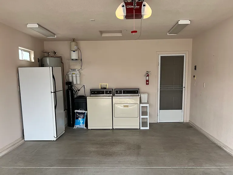 Garage appliances: brand new water softener, uodated RO system, washer, dryer and extra refrigerator