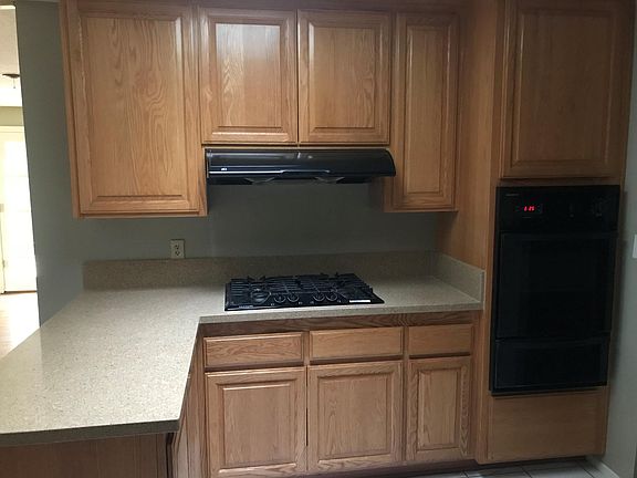 New quartz counters, new cooktop, hood and oven in kitchen -