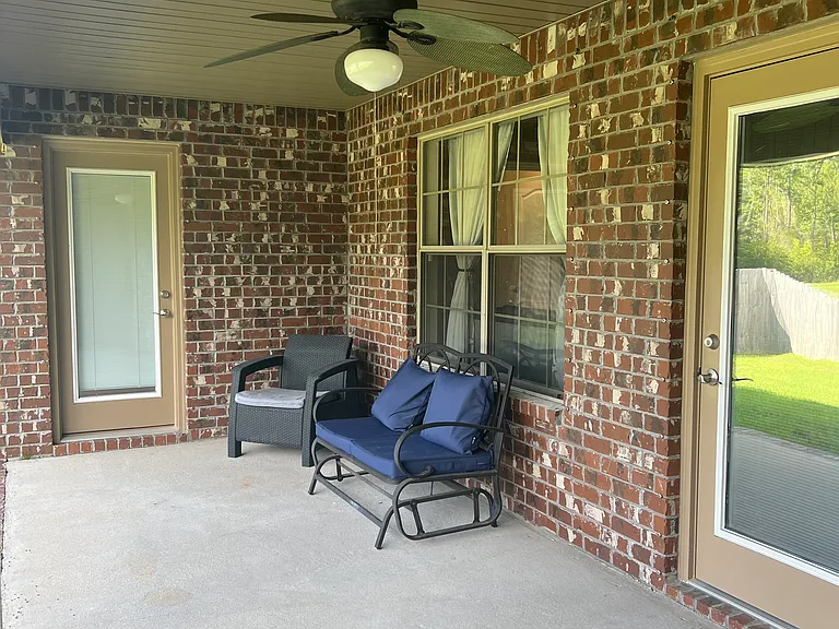 Master bedroom patio door leading to the patio on the back of the house