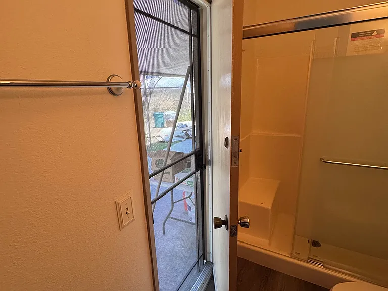 door to backyard from master bedroom