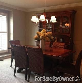 Formal Dining Room : Plantation shutters, crown molding
