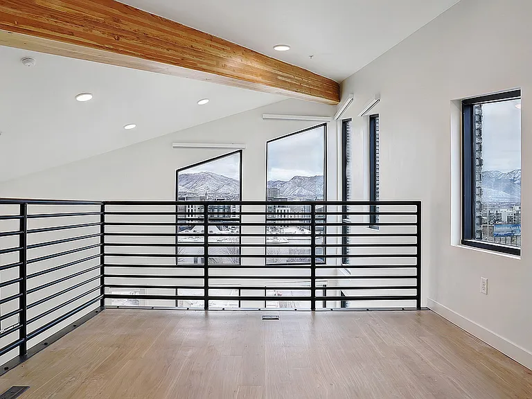 An open loft level adds flexibility and architectural interest.