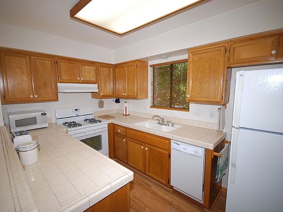 Kitchen with tiled counters