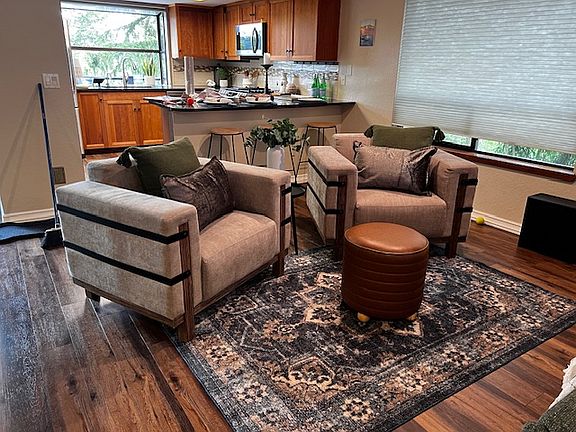 Open plan with entertainment style kitchen bar, complete with temperature controlled wine cellar.