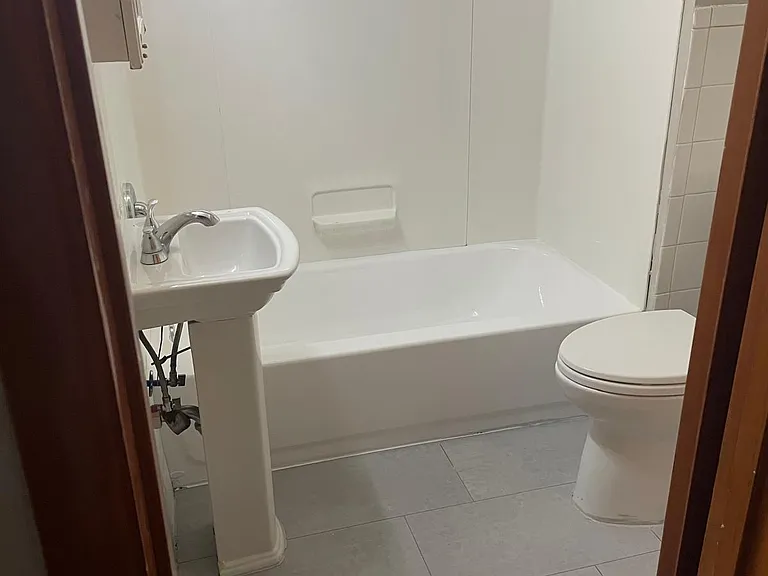 new bathtub, new flooring, freshly painted