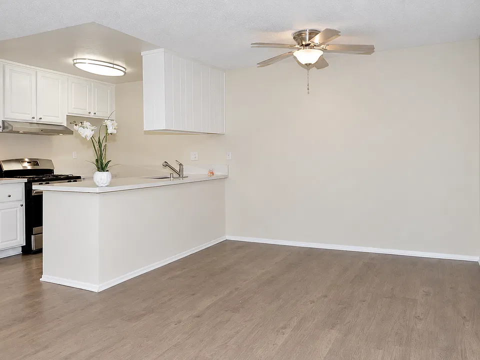 Dinning and modern kitchen with appliances and dishwasher