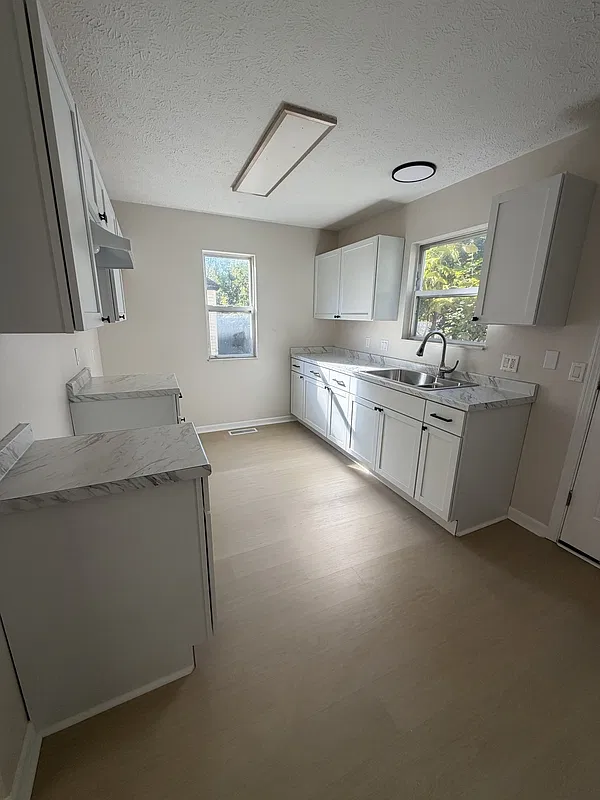 4 bed, 1.5 bath, 1440 sqft, $1,478 — Photo 3